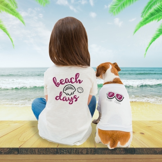 image of girl and dog displaying their htv heat transfer vinyl